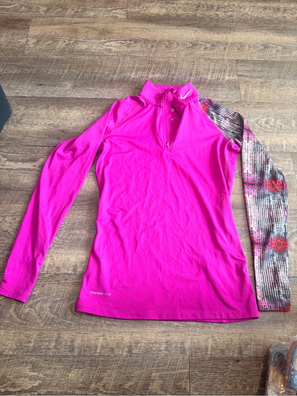 Nike Women’s Hot Pink Quarter-Zip Long Sleeve Top with Patterned Sleeve